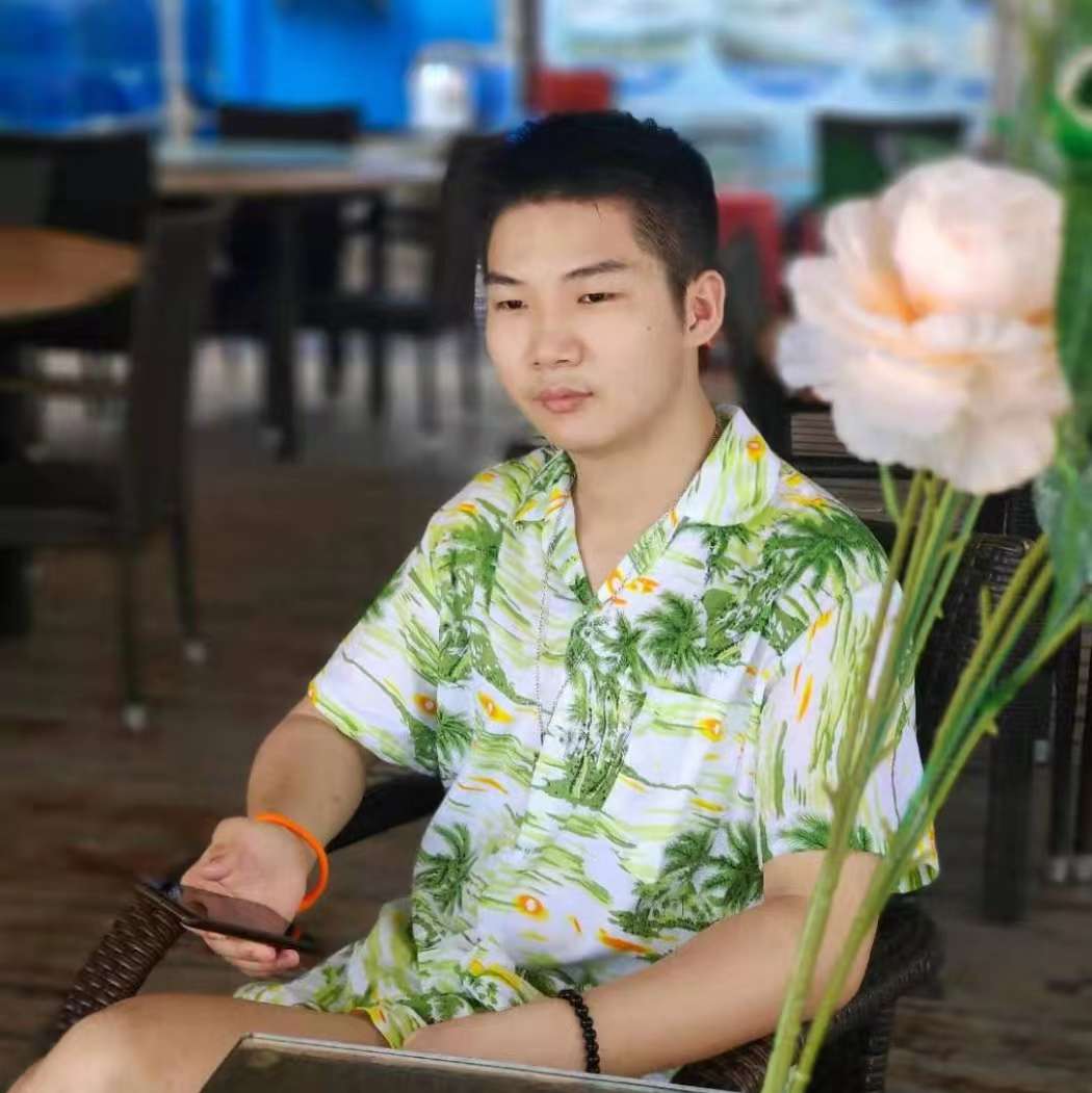 执着拿毛豆的照片